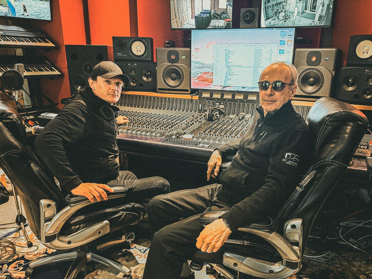Francis Rossi with a Harrison 4032c console in a recording studio