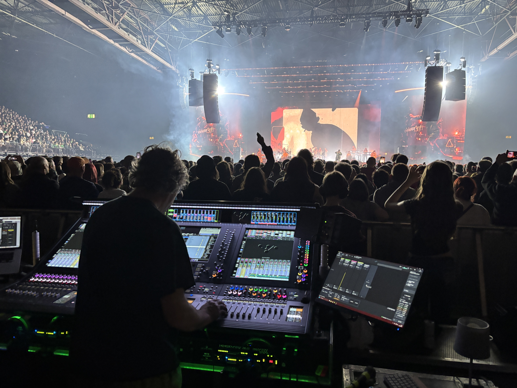 A front of house engineer using a Quantum 852 console for a Gorillaz concert
