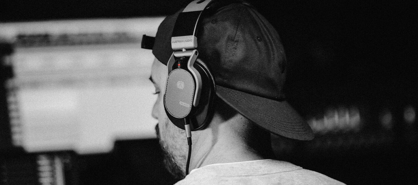 Musician wearing Austrian Audio Hi-65X headphones