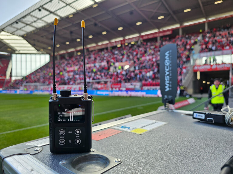 A Wisycom MRP60-IFB being used in a football stadium
